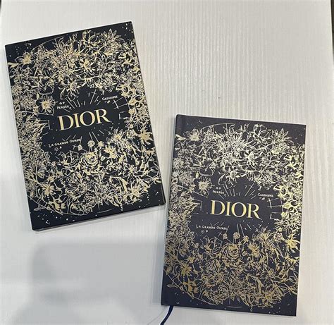 Блокноты и ежедневники Dior .